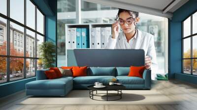 Reading glasses, laptop and professional woman, advocate or government attorney check feedback. Corporate research, eyeglasses and business lawyer analysis of legal project, development or report Wall mural