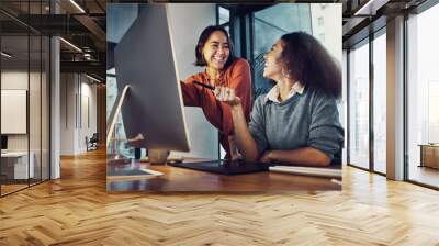 Collaboration, computer and business women in the office while working on a corporate project together. Teamwork, technology and professional female employees planning a company report in workplace. Wall mural