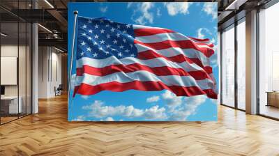 American flag, blowing in the wind, with blue sky background Wall mural