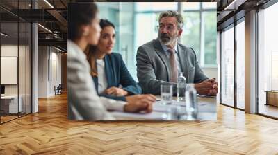 Busy older manager leader and company employees at business meeting discussing corporate management. International professional business people board team at boardroom office, Generative AI  Wall mural