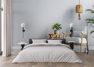 A white chair is sitting in front of a table with a potted plant on it Wall mural