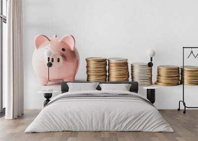 A piggy bank standing next to increasing stacks of coins, symbolizing savings growth Wall mural