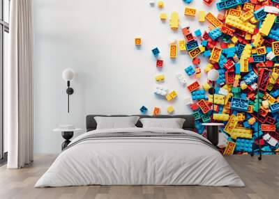 White background, white space in the center of picture. A pile of colorful Lego blocks scattered all over the place. The lego bricks of different shapes and sizes to show diversity.  Wall mural