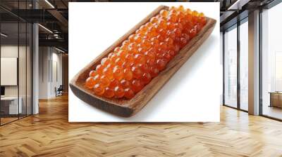 Salmon roe on a wooden tray, isolated on white background, styled in a natural and rustic manner. Wall mural