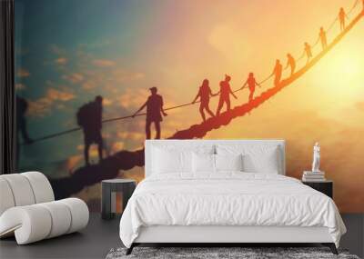 A group of people are crossing a rope bridge Wall mural