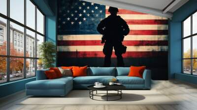 A soldier stands in front of the American flag Wall mural