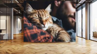 The comfort of a cat napping on its owner's chest, feeling safe Wall mural