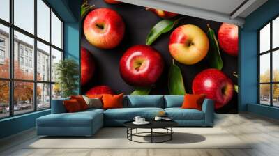 Vibrant display of red apples with green leaves Wall mural