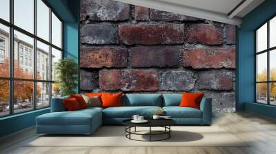 A close-up shot of an aged brick wall, showcasing the intricate details of its weathered surface. The rich. Wall mural