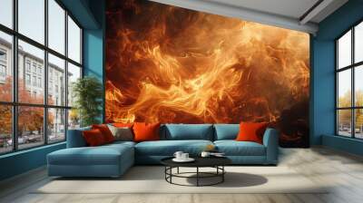 Dramatic orange flames lick the black night sky in a fiery inferno Wall mural