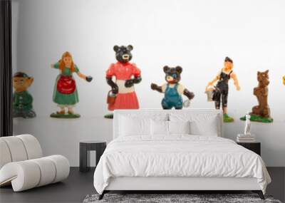 Banner panorama row of small vintage toy people and characters isolated on white Wall mural