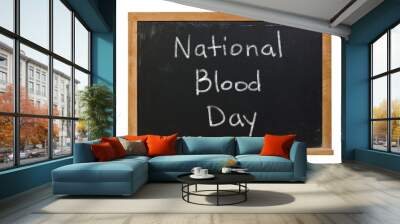 National Blood Day written in white chalk on a black chalkboard isolated on white Wall mural