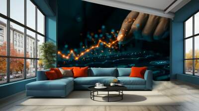 A hand interacts with a glowing financial chart, highlighting data on a rising line graph, symbolizing real-time trading, financial analysis, and dynamic market trends Wall mural