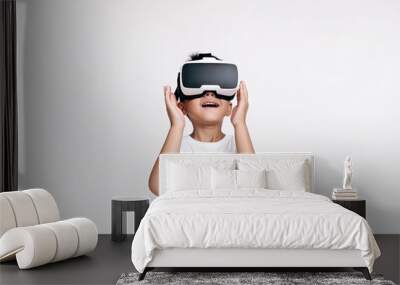 Child boy using virtual reality glasses headset. Kid looking in 3D VR goggles and playing video game. Isolated with white background. Cyberspace and metaverse concept. Generative AI. Wall mural