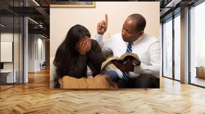 Mixed Raced Christian Couple Studying Bible Together Wall mural