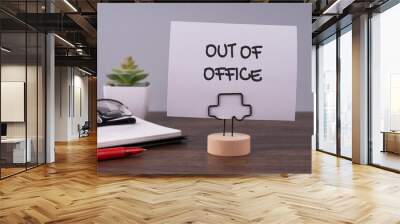 Out of office text on a paper note Wall mural