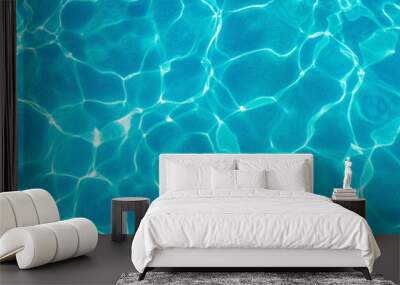 Water ripples and pattern on swimming pool surface with sunlight reflection Wall mural