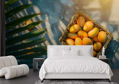  a bunch of mango on basket, harvesting season concept Wall mural