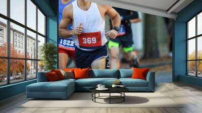 Runners running during a marathon Wall mural