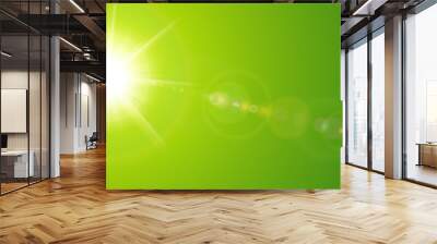 Sunny background, green sun with lens flare Wall mural