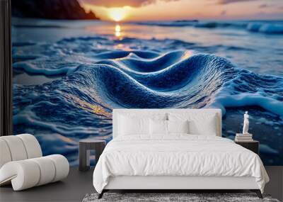 Gentle waves washing ashore at sunset on a tranquil beach with vibrant sky colors near the coastline Wall mural