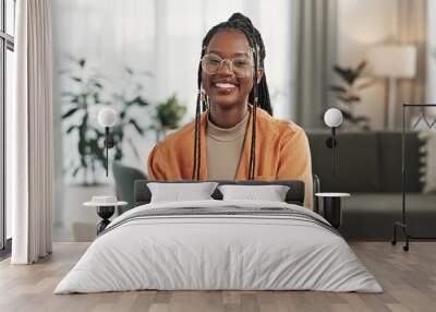 Black woman, portrait in home office and laptop for remote work, social media or blog research with smile in apartment. Happy freelancer at desk with computer for email, website or online in house. Wall mural