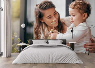 Happy woman, baby and together on porch for love, development and bonding at home. Mom, curious boy and touching plants outside for growth, trust and smiling with hug for joy, protection and wellness Wall mural