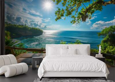 Tranquil Bali Paradise: Table Overlooking Blue Sea in Idyllic Landscape under Sunny Blue Sky Wall mural