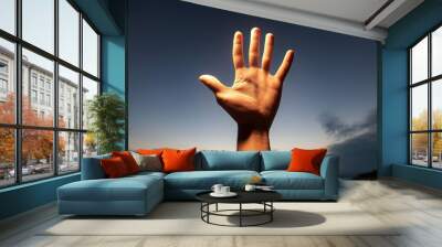 A single hand raised against a glowing backdrop, fingers outstretched, creating a sense of aspiration and hope. The soft light accentuates the hand's details, adding depth and symbolism.
 Wall mural