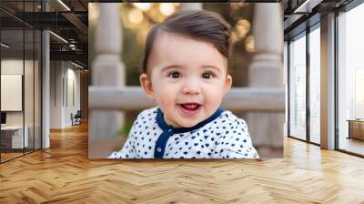 Close-up of a smiling baby boy just a few months old.  Wall mural