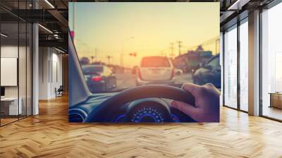 people driving car on day time . Wall mural