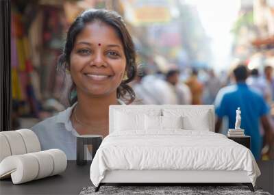 Portrait of a glad indian woman in her 30s wearing a classic white shirt in front of busy urban street Wall mural