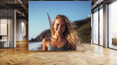 Portrait of a young Caucasian female surfer on the beach Wall mural