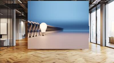 Lights bulbs in a row with one lit and with room for text Wall mural