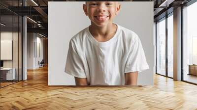 A young albino boy wearing a white t-shirt, grey background, mockup Wall mural