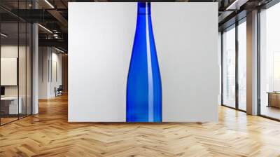 Blue glass bottle of Spanish Muscat white wine Wall mural