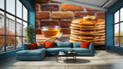 Delicious American pancake topped with liquid honey on a rustic brick background. Selective focus Wall mural