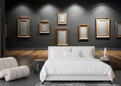 Empty picture frames in art gallery with dark wall and wooden floor Wall mural