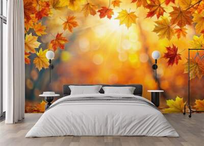 Golden autumn leaves falling from the trees on a sunny day with a bokeh background Wall mural