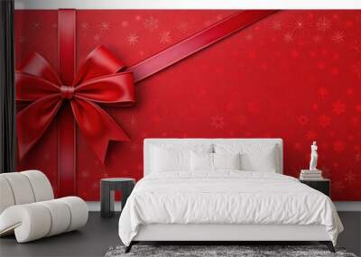 Vibrant red gift card background with ribbon bow and blank copy space for Christmas wishes Wall mural