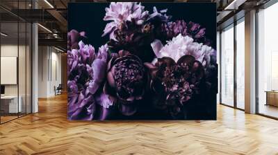 Beautiful Violet peonies bouquet on black. Floral background. Natural flowers pattern Wall mural