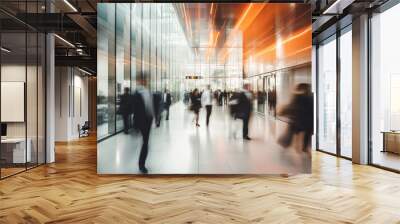 Blurred Silhouettes of Business People in lobby of modern business center. Abstract light motion blur effects Wall mural