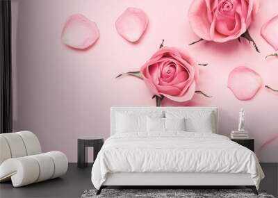 Floral monochrome composition of rose buds and petals on pink banner, copy space Wall mural