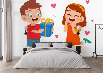 cute boy give present to little girl for celebrate birthday Wall mural