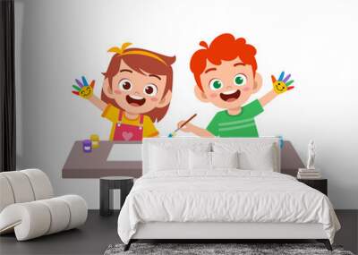 cute little boy and girl using paint to hand for art Wall mural