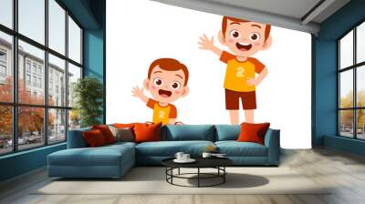 cute little boy say hello with young brother Wall mural