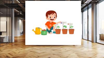 cute little boy take care of vegetable plant Wall mural