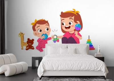 cute little girl play with baby sibling together Wall mural