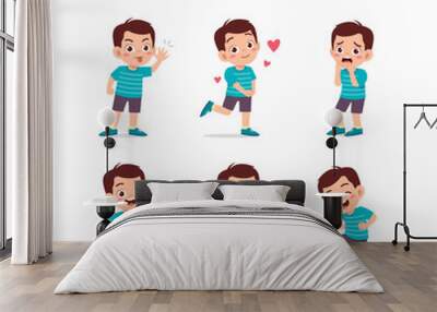 cute little kid boy in various expressions and gesture set Wall mural