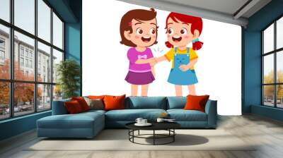 cute little kid girl do hand shake with her friend Wall mural